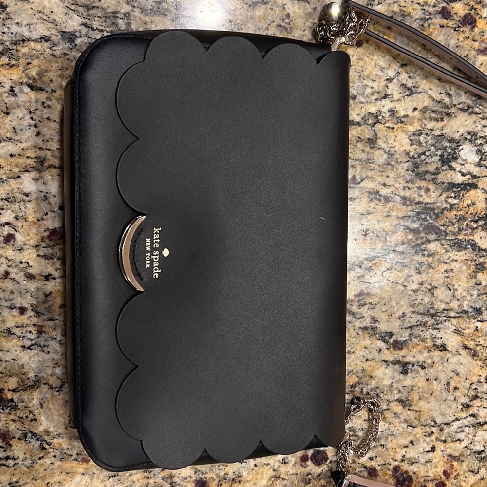 Black Kate Spade crossbody. Good condition.